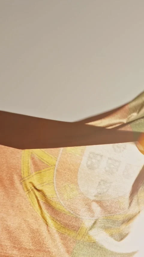 The bright sun breaks through the fabric of the flag of Portugal Stock Footage 328290277