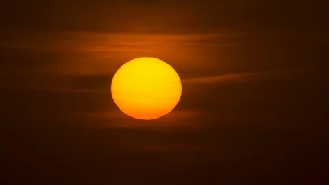 The bright sun on the cloud background. time lapse Video stock 118883083
