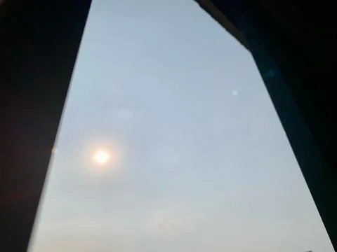 Bright Sun Framed by Dark Home Window Interior View Stock Photos