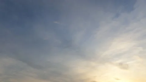 Bright sun light ray n sunbeam flare shining through dramatic golden gray  cloud Stock Footage 147387506