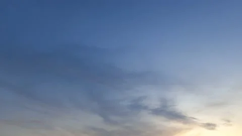 Bright sun light ray n sunbeam flare shining through dramatic golden gray cloud Video stock 147387527