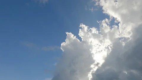 Bright Sun light ray n sunbeam with fluffy white cloud blue sky Video stock 160952822
