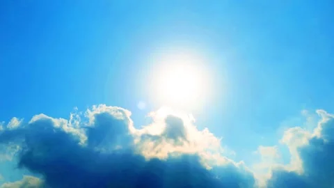 Bright sun light ray n bokeh sunlight lens flare on pastel cyan blue clear sky Stock Footage 310250314