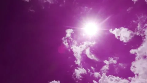 Bright sun light ray on purple pink sky with rain storm clouds Stock Footage 155053375