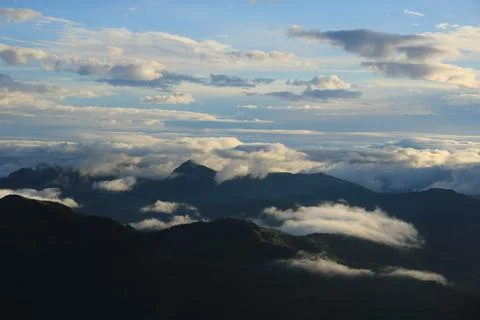 Bright sun lit clouds over the Entlebuch Region, Lucerne Canton. Stock Photos
