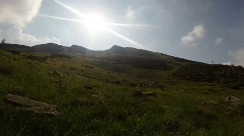 Bright sun over a mountain slope Stock Footage 40745253