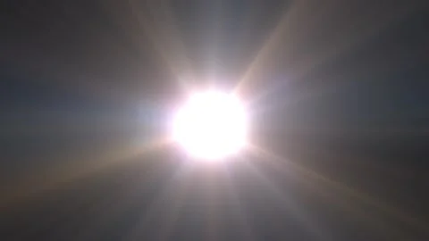 Bright sun radiates rays across dark sky Stock Footage 345434914