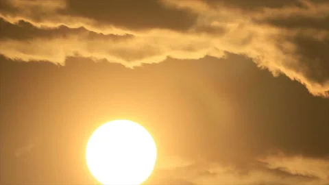 Bright sun rises from clouds Stock Footage 148501904
