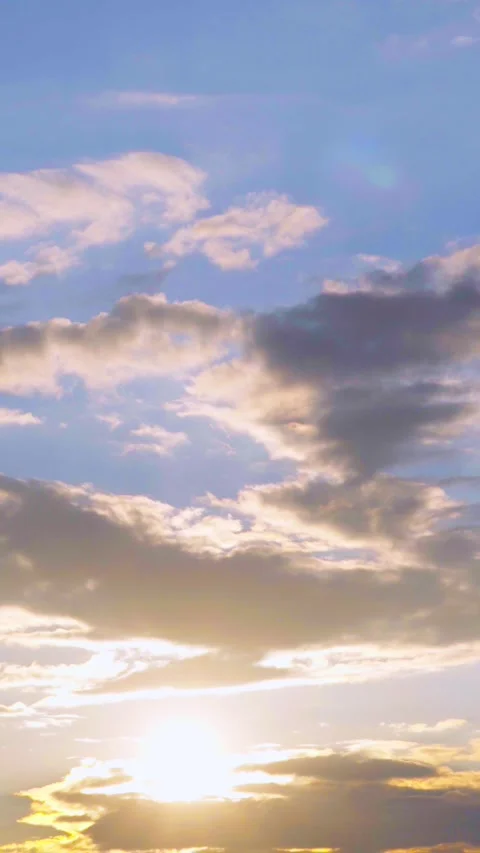 Bright Sun Setting Behind Clouds In Vertical Sky Timelapse Stock Footage 345340149