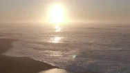 Bright Sun Setting Over Ocean Waves Stock Footage