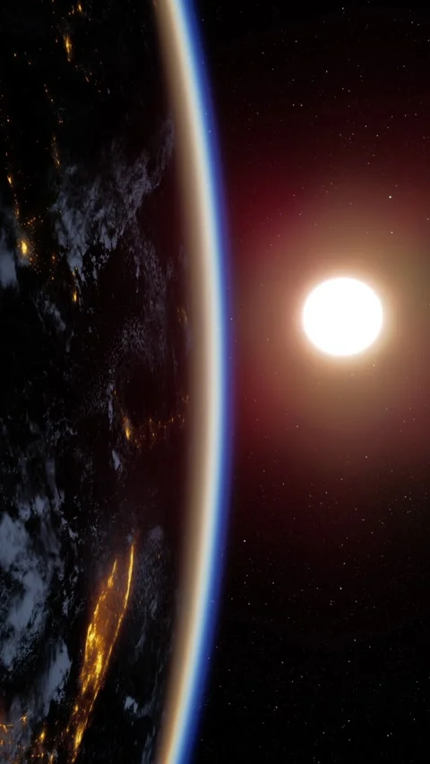 Bright sun shines over Earth from space showing city lights at night Stock Footage 341048208