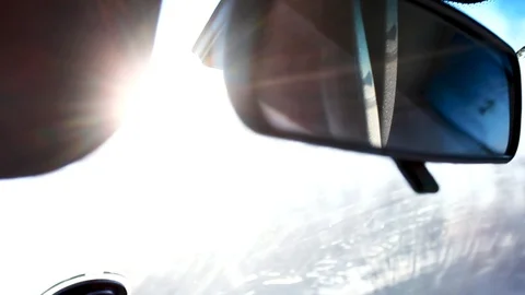 Bright sun shines in the windshield of the car shot close-up. Stock Footage 115823411