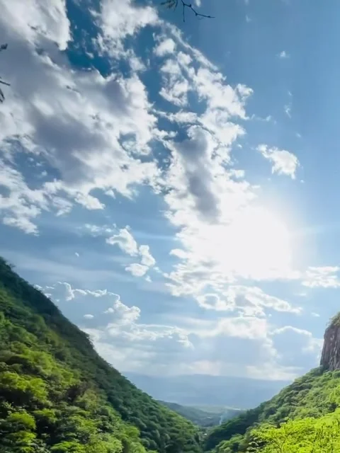 Bright Sun Shining Over Lush Mountain Valley Video stock 341320357