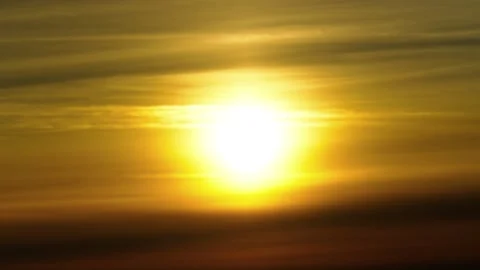 The bright sun at sunset breaks through the extraordinarily beautiful clouds. Stock Footage 320514204