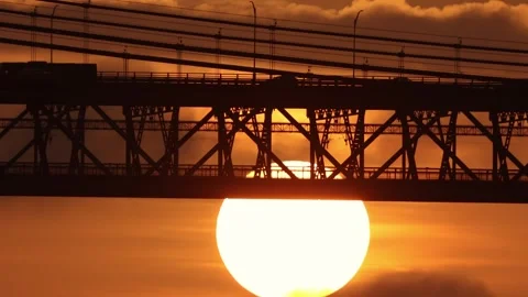 Bright sun at sunset under the bridge Stock Footage 255042526
