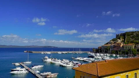 Bright sun in warm summer day over the bay of the peninsula in Tuscany. Stock Footage 109514246
