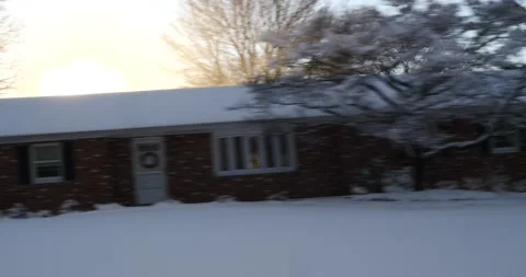 Bright sunburst over a snowy winter landscape Stock Footage 171908355