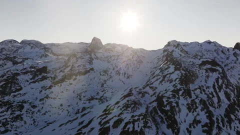 Bright sunlight casting golden glow over snow capped Pyrenees peaks, revealing Stock Footage 306709519
