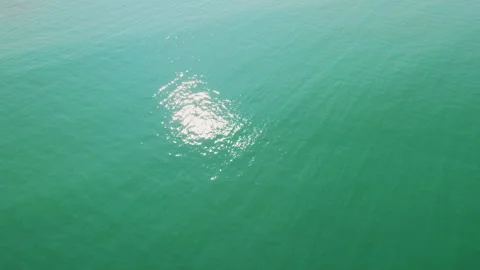Bright sunlight reflecting on turquoise ocean water surface in Costa Rica Stock-Footage 327414436