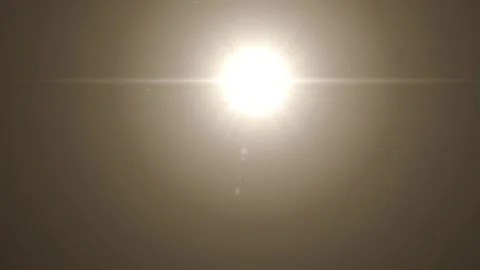 Bright Sunlight in the Sky with Lens Flare and Halo Effect on Clear Day Video stock 338301433