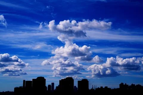 Bright Sunny Sky with Dramatic Clouds Stock Photos