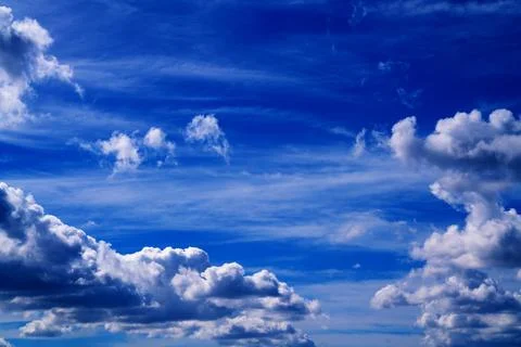 Bright Sunny Sky with Dramatic Clouds Stock Photos