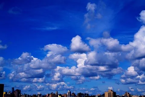 Bright Sunny Sky with Dramatic Clouds Stock Photos