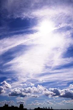 Bright Sunny Sky with Dramatic Clouds Stock Photos