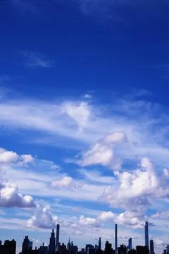 Bright Sunny Sky with Dramatic Clouds Stock Photos