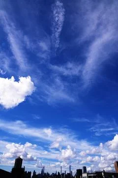 Bright Sunny Sky with Dramatic Clouds Stock Photos
