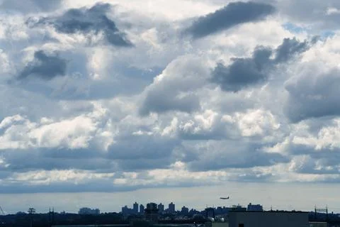 Bright Sunny Sky with Dramatic Clouds Stock Photos