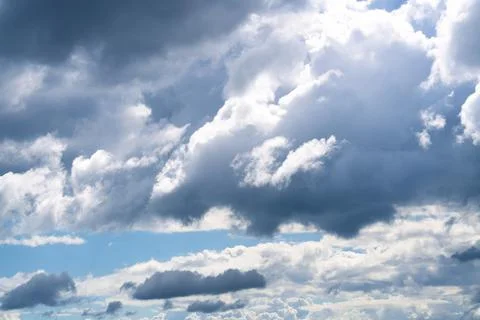 Bright Sunny Sky with Dramatic Clouds Stock Photos
