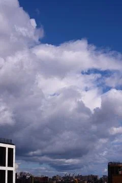 Bright Sunny Sky with Dramatic Clouds Stock Photos