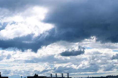 Bright Sunny Sky with Dramatic Clouds Stock Photos