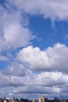 Bright Sunny Sky with Dramatic Clouds Stock Photos