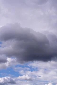 Bright Sunny Sky with Dramatic Clouds Stock Photos