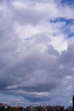 Bright Sunny Sky with Dramatic Clouds Stock Photos