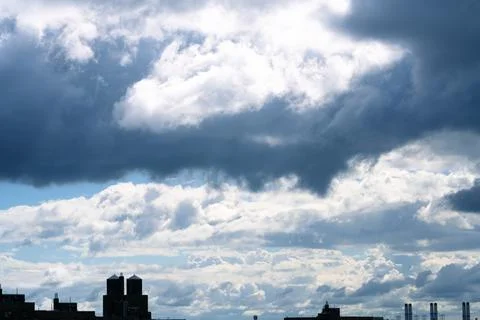 Bright Sunny Sky with Dramatic Clouds Stock Photos