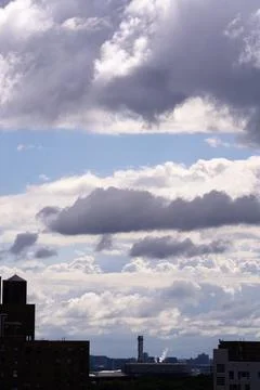 Bright Sunny Sky with Dramatic Clouds Stock Photos