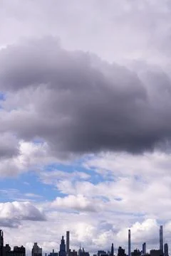 Bright Sunny Sky with Dramatic Clouds Stock Photos