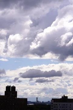 Bright Sunny Sky with Dramatic Clouds Stock Photos