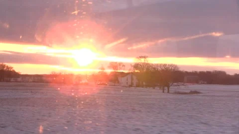 Bright sunrise train window round flare Stock Footage 156258730