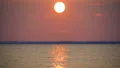 The bright sunset above the water 4k or 4k+ Resolution