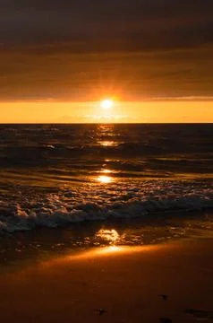 Bright sunset after the storm. Stock Photos