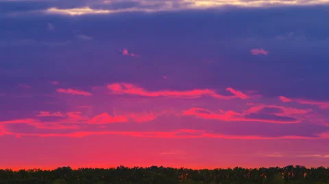 The bright sunset against the background of cloud stream. Time lapse Stock-Footage 64103178