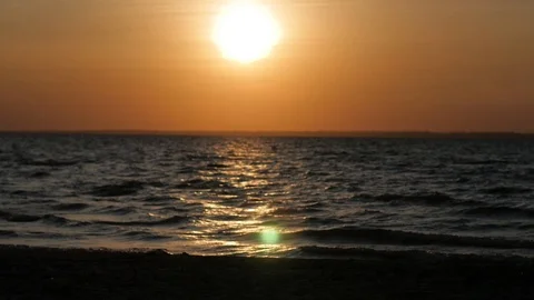 Bright sunset with large yellow sun under the sea surface Stock-Footage 103835322
