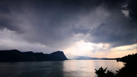 Bright sunset over the Alps mountains. Time lapse. Lake Lucerne. Switzerland Stock Footage 111008026