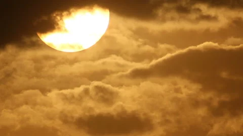 Bright sunset sun in the clouds Stock Footage 125339584