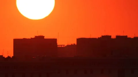 Bright sunset sun in town Stock Footage 96337992