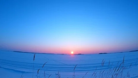 Bright sunset on a winter lake Stock-Footage 86659920